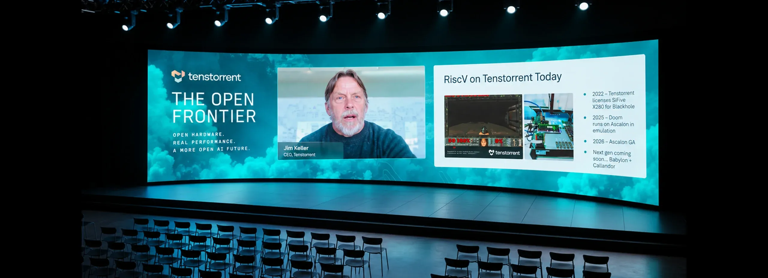 Curved LED wall showing The Open Frontier stage design and live talk slides above the auditorium seating